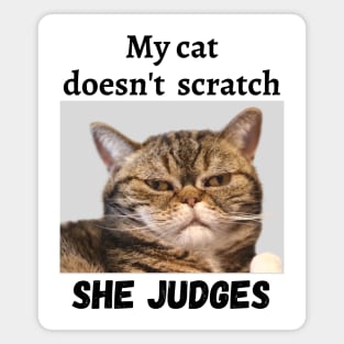 My cat doesn't scratch she Judges Magnet